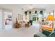 Bright living room with vaulted ceilings, and view of the backyard at 114 Ridge View Dr, Davenport, FL 33837