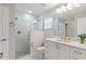 Updated bathroom with a frameless shower and modern vanity at 114 Ridge View Dr, Davenport, FL 33837