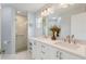 Modern bathroom with double vanity and walk-in shower at 114 Ridge View Dr, Davenport, FL 33837