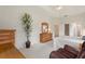 Main bedroom with king-size bed, dresser, and relaxing chair at 114 Ridge View Dr, Davenport, FL 33837