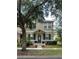 Two story house with green shutters at 7132 Five Oaks Dr, Saint Cloud, FL 34773