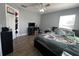 Spacious bedroom with a ceiling fan, large windows and plenty of closet space at 7132 Five Oaks Dr, Saint Cloud, FL 34773