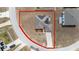 Aerial view of single-Gathering home with solar panels and driveway at 340 Elderberry Ct, Kissimmee, FL 34759