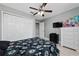 Bright bedroom with double bed and built-in closet at 340 Elderberry Ct, Kissimmee, FL 34759