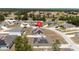 Aerial view of the house and surrounding neighborhood at 340 Elderberry Ct, Kissimmee, FL 34759