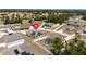 Aerial view of a house with solar panels, located in a residential neighborhood at 340 Elderberry Ct, Kissimmee, FL 34759