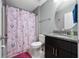 Bathroom with shower/tub combo and granite vanity at 340 Elderberry Ct, Kissimmee, FL 34759