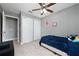 Well-lit bedroom with a twin bed and plenty of closet space at 340 Elderberry Ct, Kissimmee, FL 34759