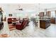 Open living room and kitchen with island at 2516 Pickett Ave, Saint Cloud, FL 34772