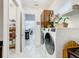 Bright laundry room with access to pantry and kitchen at 2516 Pickett Ave, Saint Cloud, FL 34772
