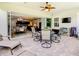 Spacious screened lanai with patio furniture, adjacent to dining room at 2516 Pickett Ave, Saint Cloud, FL 34772