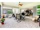 Relaxing screened lanai with seating area, overlooks backyard at 2516 Pickett Ave, Saint Cloud, FL 34772