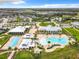 Community pool, clubhouse, and surrounding homes at 2516 Pickett Ave, Saint Cloud, FL 34772