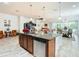 Open concept kitchen with island and stainless steel appliances at 2516 Pickett Ave, Saint Cloud, FL 34772
