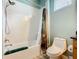 Clean bathroom with a shower/tub combo and white fixtures at 2516 Pickett Ave, Saint Cloud, FL 34772