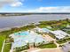 Community pool and clubhouse near lake at 2516 Pickett Ave, Saint Cloud, FL 34772