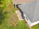 Backyard with patio, grill, and partial house view at 2516 Pickett Ave, Saint Cloud, FL 34772