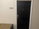 Condo front door entrance with black door and number 12107 at 239 Longview Ave # 107, Celebration, FL 34747