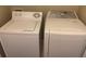 Laundry room with washer and dryer included at 239 Longview Ave # 107, Celebration, FL 34747