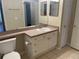 Bathroom with single sink vanity and a toilet at 239 Longview Ave # 107, Celebration, FL 34747