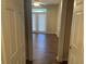 Bedroom with double doors leading to patio/balcony at 239 Longview Ave # 107, Celebration, FL 34747