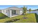 New construction home with backyard and patio at 4043 Bannock Ave, Tavares, FL 32778