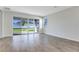 Living area with sliding glass doors opening to a patio at 4043 Bannock Ave, Tavares, FL 32778
