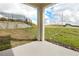 Covered patio with concrete flooring and view of backyard at 6357 Clover St, Lake Hamilton, FL 33851