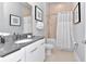 Modern bathroom with gray vanity and bathtub at 7770 Sandy Ridge Dr # 142, Kissimmee, FL 34747