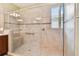 Large walk-in shower with tiled walls and seat at 694 Irvine Ranch Rd, Kissimmee, FL 34759