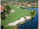 Landscaped golf course with water features at 694 Irvine Ranch Rd, Kissimmee, FL 34759
