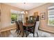 Charming dining room features a table, chairs and buffet at 694 Irvine Ranch Rd, Kissimmee, FL 34759