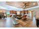 Open floor plan connecting living, kitchen and dining areas at 694 Irvine Ranch Rd, Kissimmee, FL 34759