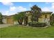 One story house with attractive landscaping and driveway at 694 Irvine Ranch Rd, Kissimmee, FL 34759