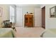 Bedroom with twin beds and wooden cabinet at 694 Irvine Ranch Rd, Kissimmee, FL 34759