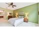 Bright bedroom with double bed, nightstands, and built-in dresser at 694 Irvine Ranch Rd, Kissimmee, FL 34759