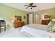 Bedroom with a double bed, dresser, and an office space at 694 Irvine Ranch Rd, Kissimmee, FL 34759