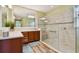 Bathroom with double vanity, large shower, and tile floors at 694 Irvine Ranch Rd, Kissimmee, FL 34759