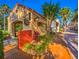 Landscaped community walkway with local business at 694 Irvine Ranch Rd, Kissimmee, FL 34759