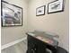 Game room features a retro arcade game and aviation-themed art at 2955 Beach Palm Ave, Kissimmee, FL 34747