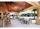 Relaxing outdoor space with tables and a bar at 2955 Beach Palm Ave, Kissimmee, FL 34747