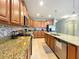 Well-equipped kitchen boasting granite countertops and ample cabinetry at 2955 Beach Palm Ave, Kissimmee, FL 34747