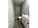 Modern bathroom with gray tile shower and white vanity at 1541 N Hudson St, Orlando, FL 32808