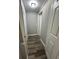 Clean hallway with gray walls and wood-look floors at 1541 N Hudson St, Orlando, FL 32808