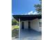Covered carport area with additional storage space at 1541 N Hudson St, Orlando, FL 32808
