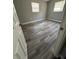 Well-lit bedroom featuring updated flooring and neutral decor at 1541 N Hudson St, Orlando, FL 32808