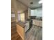 Modern kitchen with granite countertops and stainless steel appliances at 1541 N Hudson St, Orlando, FL 32808