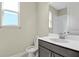 Clean bathroom, vanity with sink, toilet and shower at 171 Bull Frog Ln, Umatilla, FL 32784