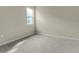 Spacious bedroom featuring neutral wall tones and carpet at 171 Bull Frog Ln, Umatilla, FL 32784