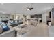 Open living space featuring a comfortable seating area and kitchen views at 1770 Sawyer Palm Pl, Kissimmee, FL 34747